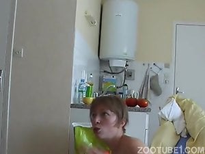 Young slut gives her pussy and asshole for a dog to lick